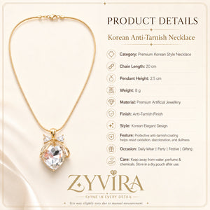 Product details card for the gold crystal heart bow necklace