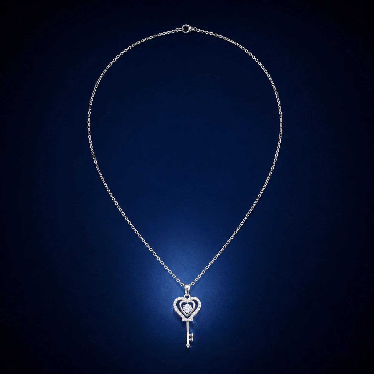 Gold heart key necklace styled in an elegant jewellery flat lay