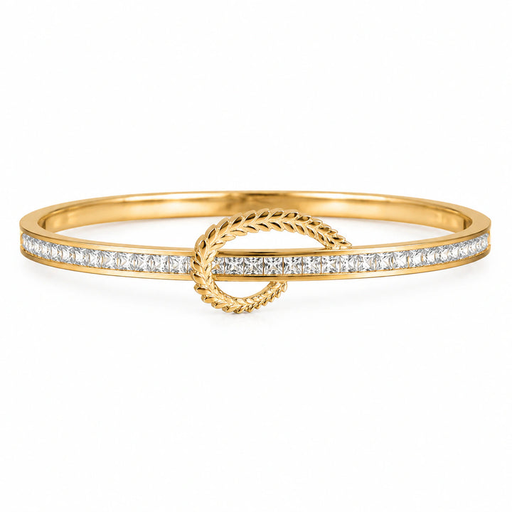 Gold-tone crystal leaf knot rigid kada bracelet