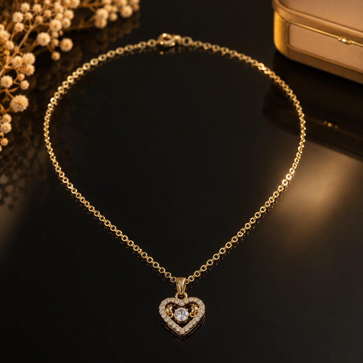 Alternate detail view of the gold crystal open-heart pendant