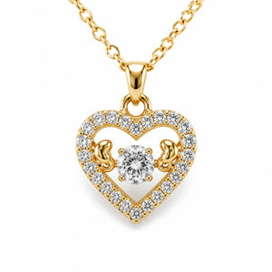 Gold crystal open-heart necklace on a dark jewellery studio display