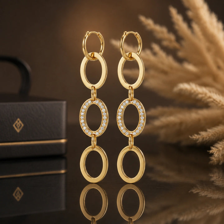 Gold crystal-style oval-link statement dangle earrings