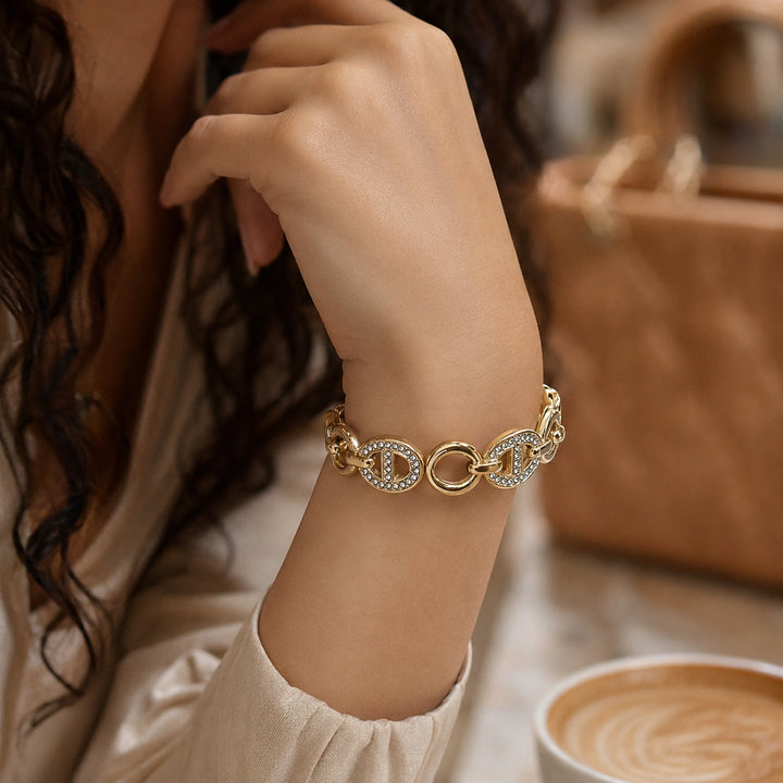 Gold-tone crystal oval medallion link bracelet