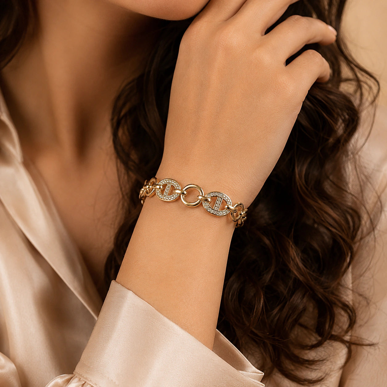 Top view of the gold crystal oval-medallion bracelet