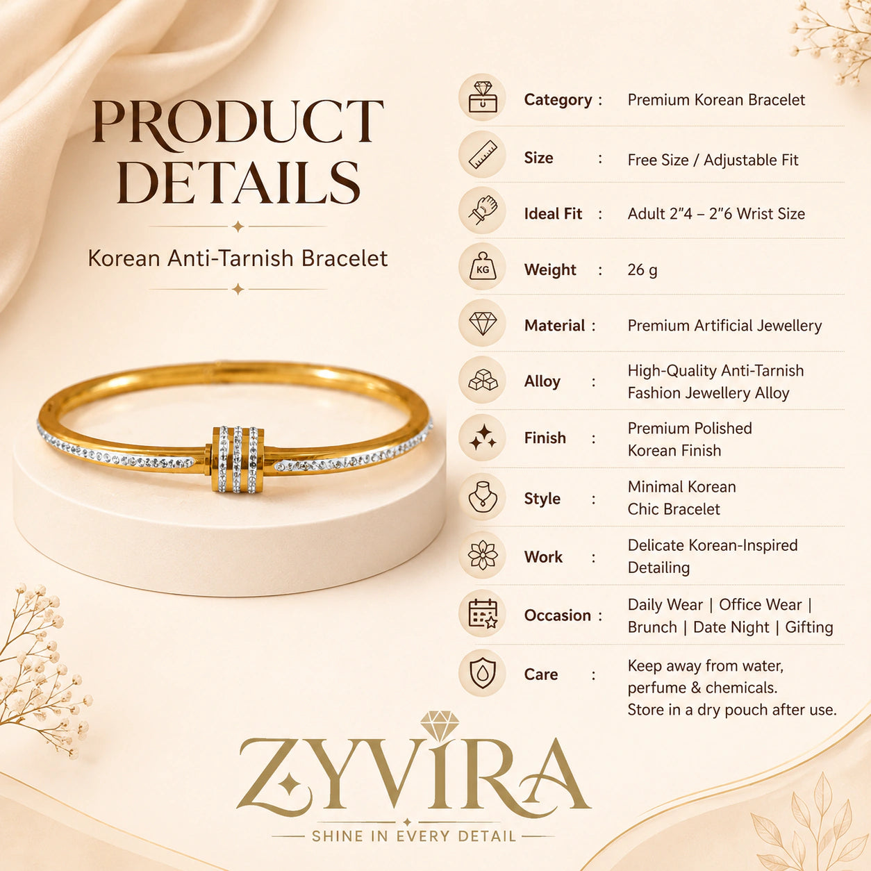 Gold crystal teardrop kada styled in an elegant jewellery flat lay