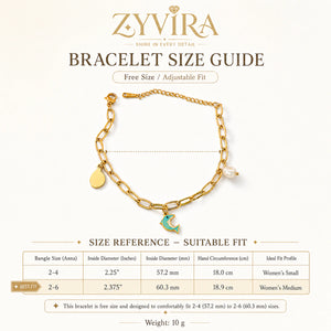 Gold dolphin pearl bracelet styled in a beach-inspired jewellery flat lay