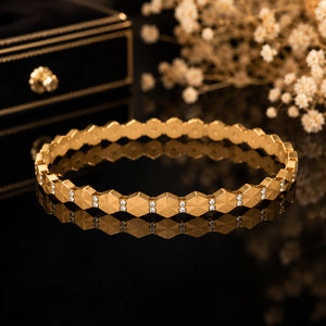 Alternate product view of the gold faceted geometric bracelet