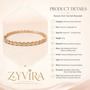 Gold geometric crystal bracelet styled in an elegant jewellery flat lay