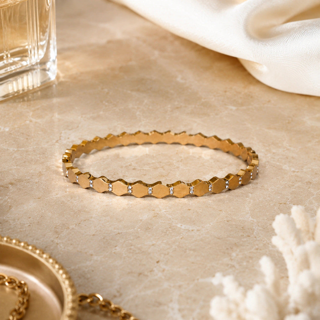 Close-up of faceted geometric links and crystal-style detailing