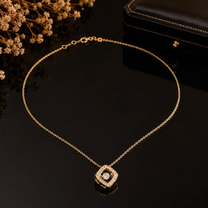 Gold floating crystal necklace styled in an elegant jewellery flat lay