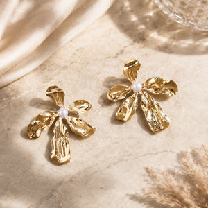 Alternate product view of gold floral pearl statement earrings