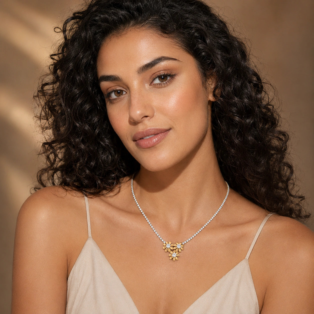 Alternate product view of the gold floral trio necklace