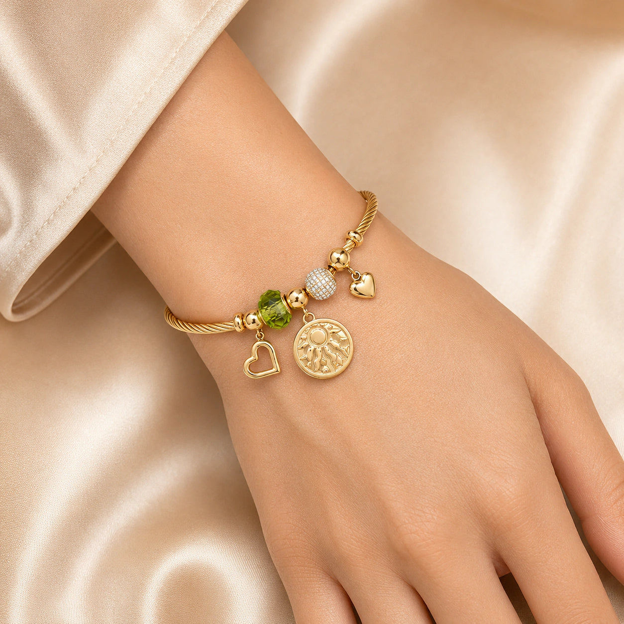 Side view of the gold green bead heart charm kada