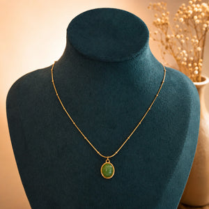 Alternate product view of the gold green cabochon necklace