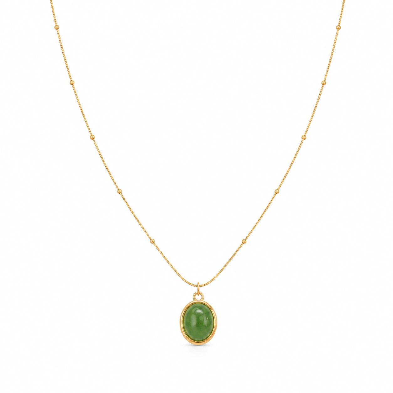 Angled view of the gold green cabochon bead necklace