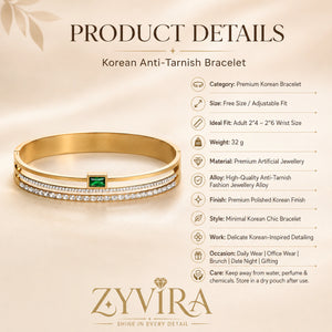 Gold green crystal bangle styled in an elegant jewellery flat lay