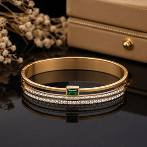 Gold-tone green rectangular crystal-style rigid bangle bracelet