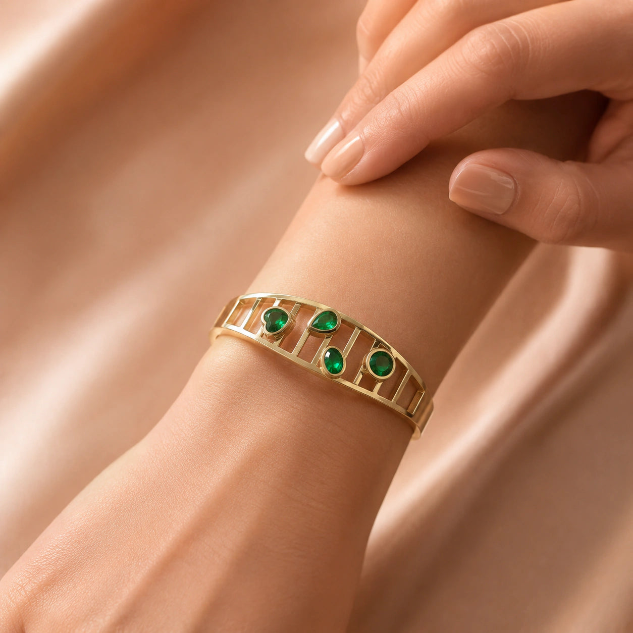 Alternate product view of the gold green stone openwork kada