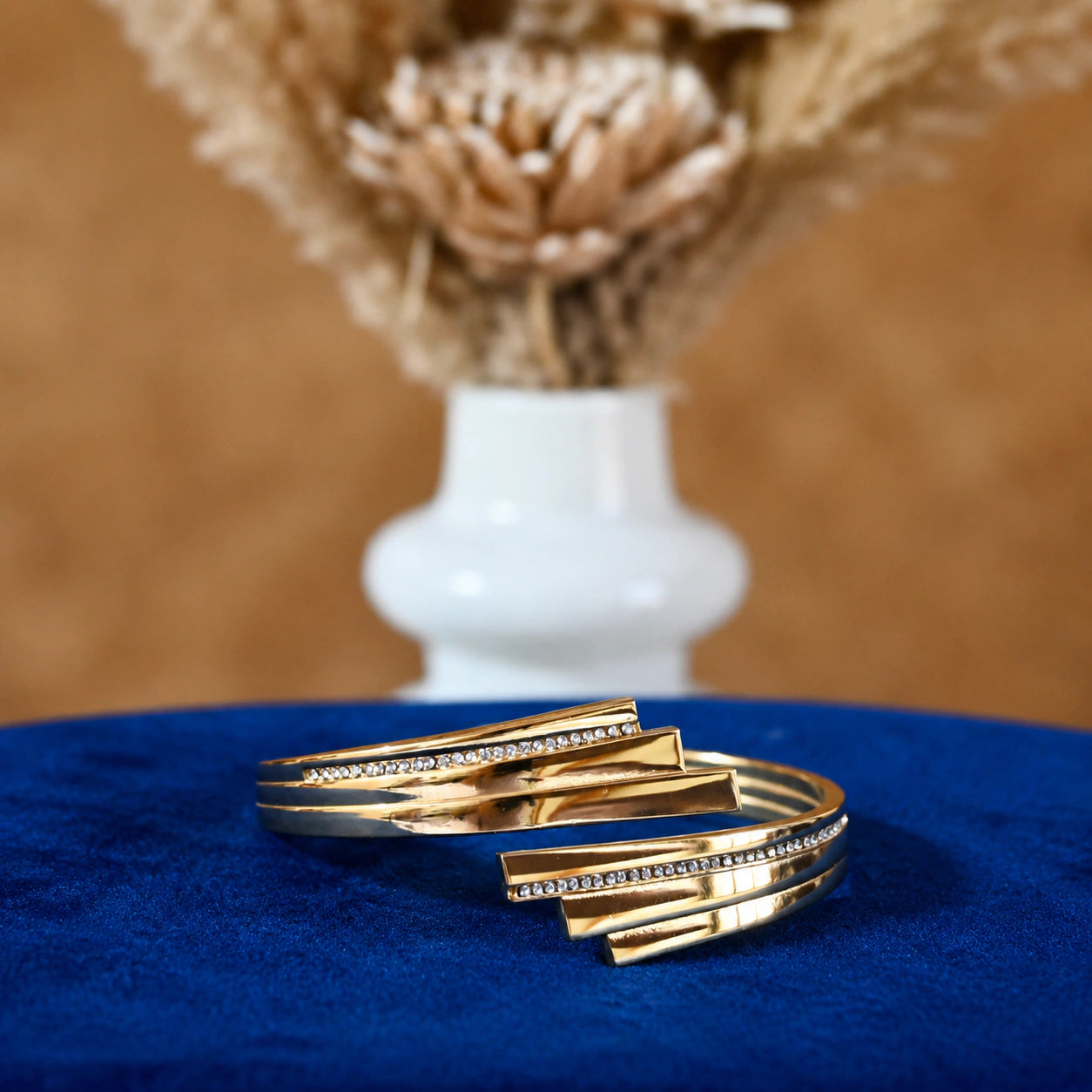 Alternate detail view of the layered stepped-bar crystal cuff