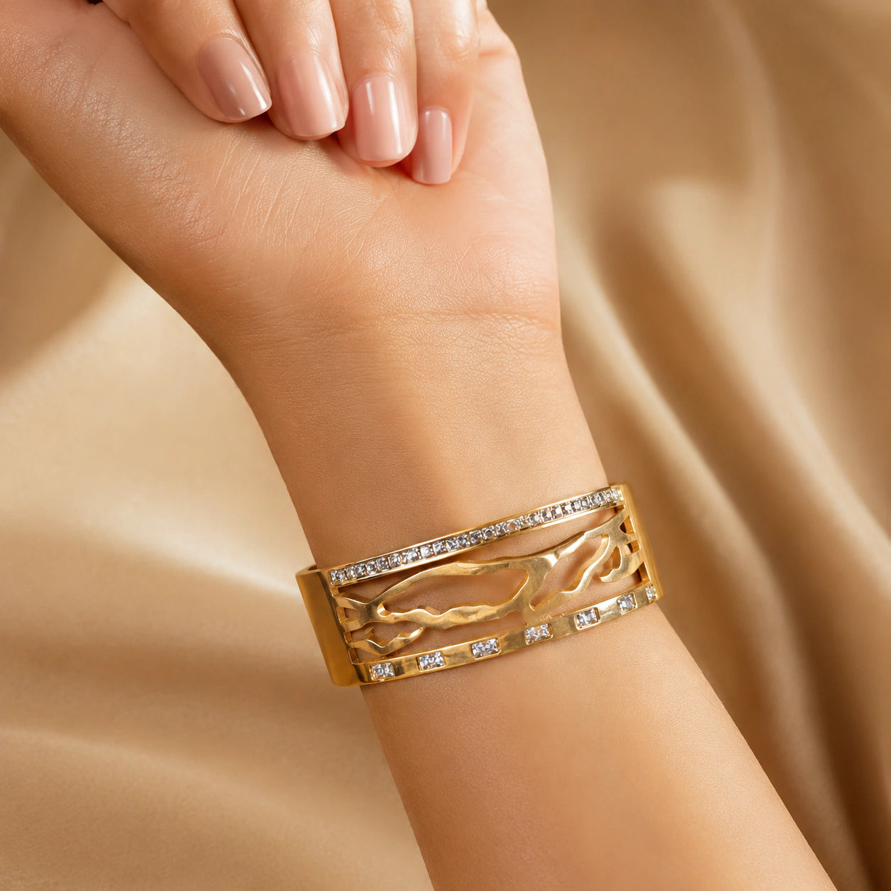 Gold marquise crystal kada styled in an elegant jewellery flat lay
