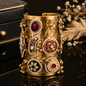Angled view of the gold multicolor Kundan handwork kada