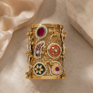 Detailed view of the handcrafted gold-tone kada surface
