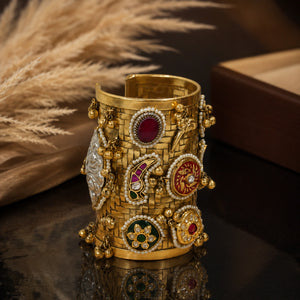 Top view of the gold multicolor Kundan handwork kada