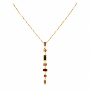 Angled view of the gold multigem geometric Y necklace