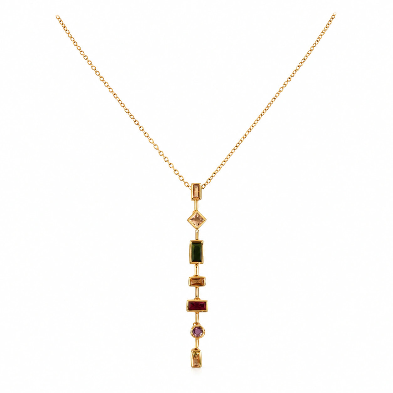 Angled view of the gold multigem geometric Y necklace