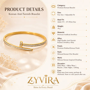 Gold nail-wrap crystal kada styled in an elegant jewellery flat lay