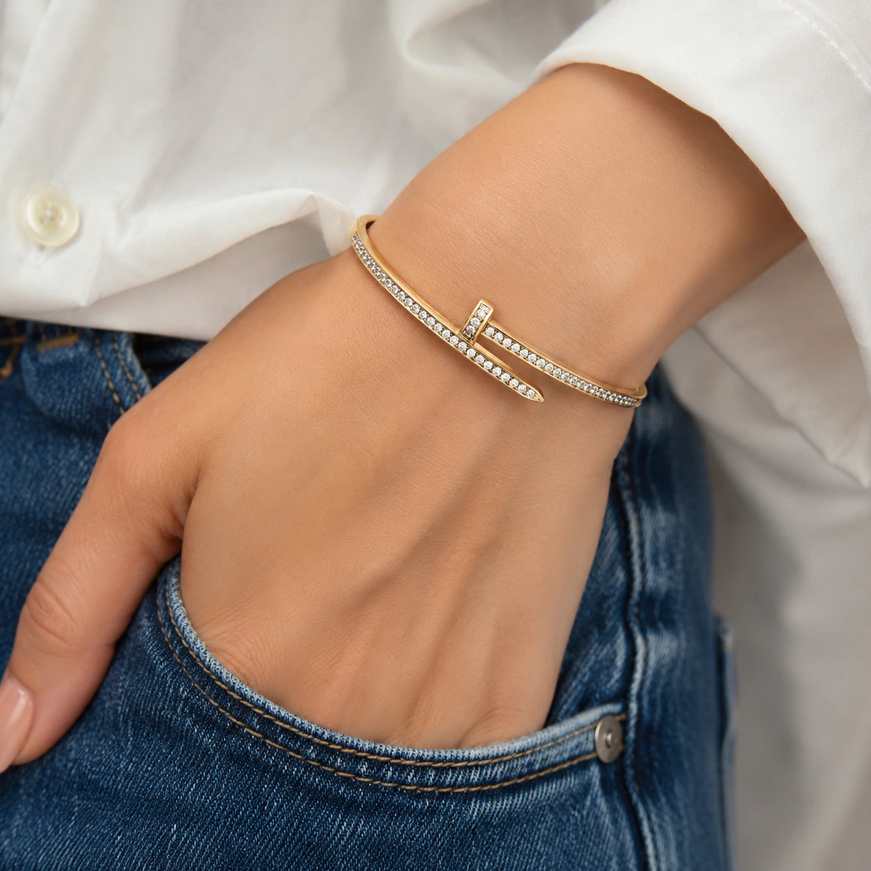 Side view of the gold nail-wrap crystal kada