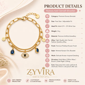 Gold navy blue evil-eye bracelet styled in a beach-inspired jewellery flat lay