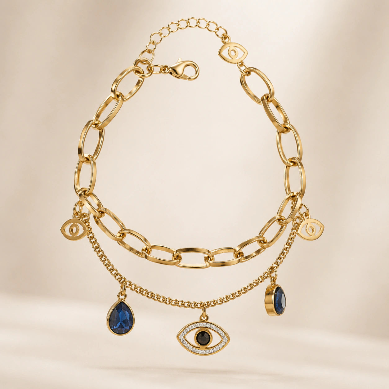 Side view of the gold navy blue evil-eye charm bracelet