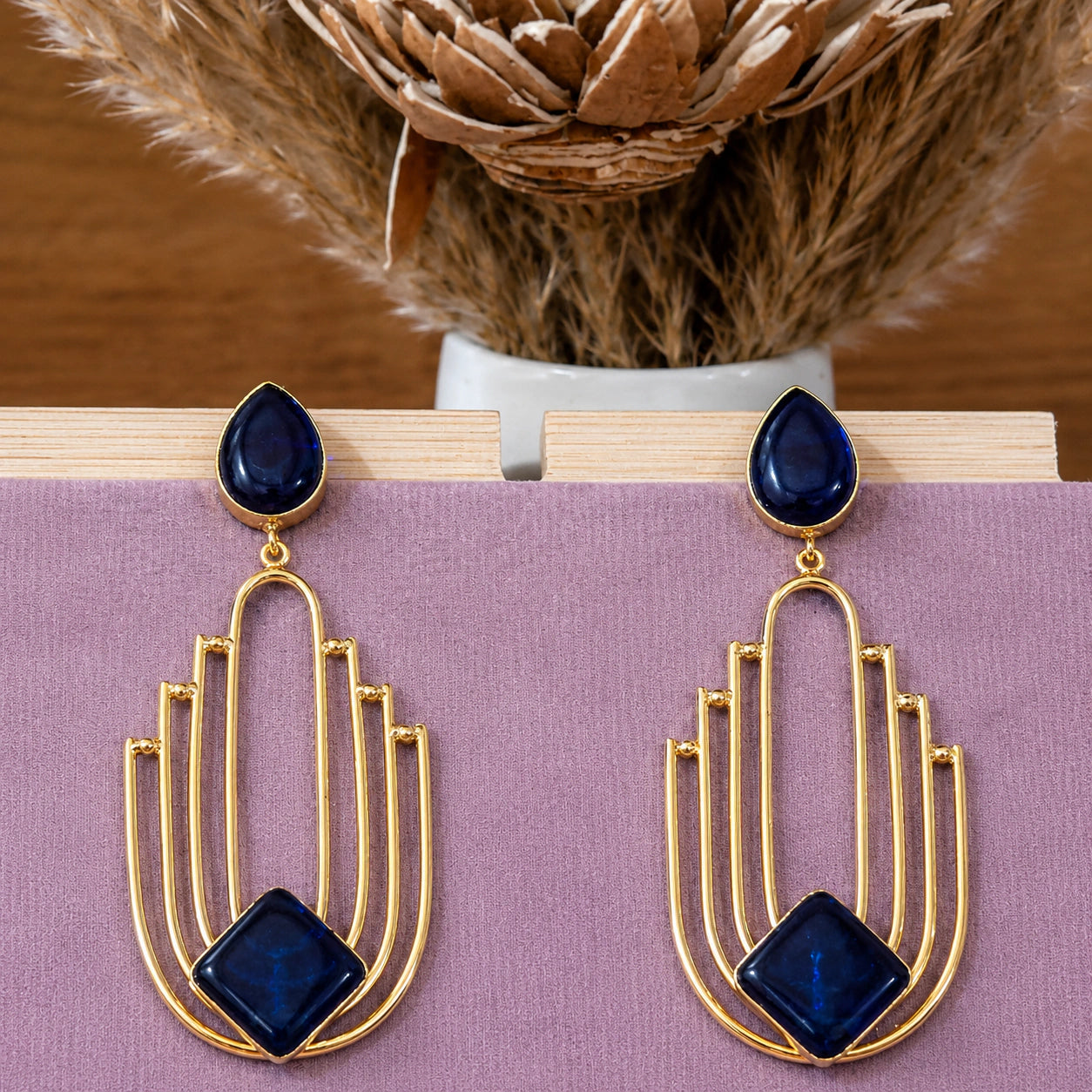 Alternate detail view of navy geometric chandelier earrings