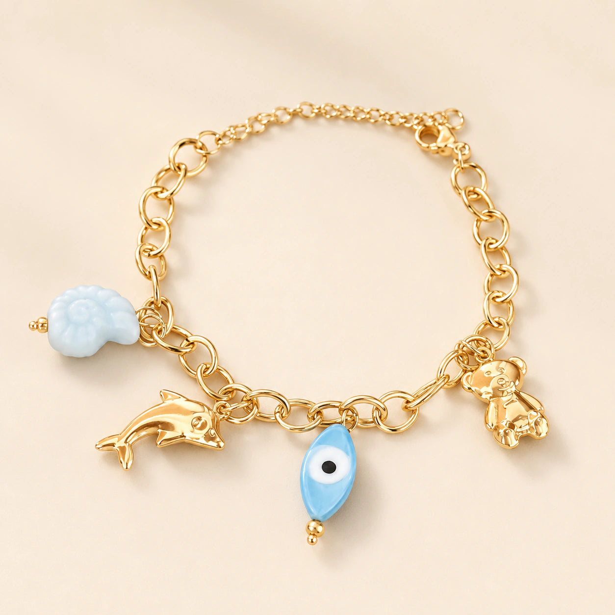 Alternate product view of the gold ocean charm blue bracelet