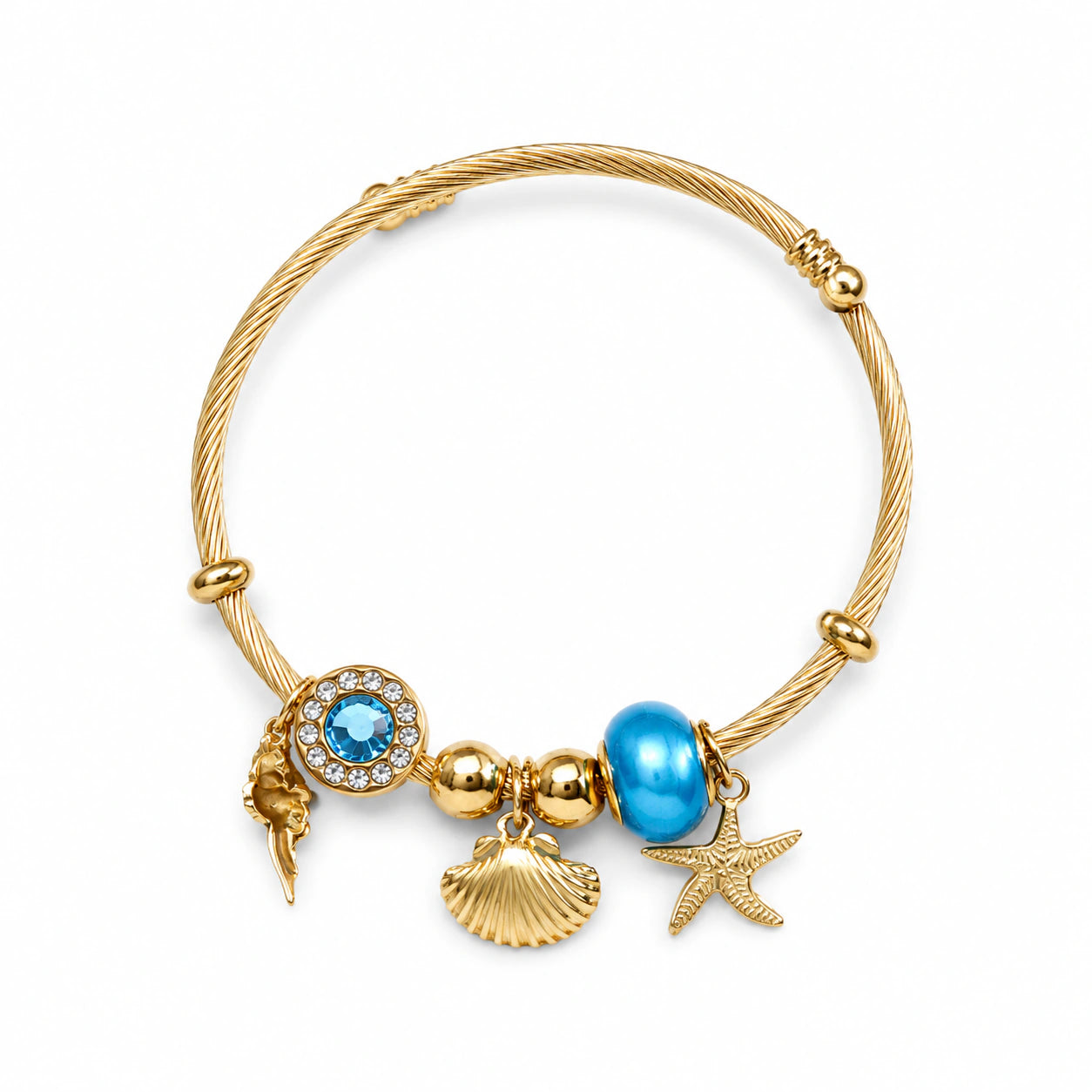 Close-up of shell, starfish and ocean charm detailing
