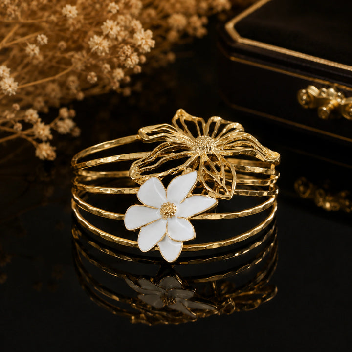 Gold openwork floral multi-band kada on a dark jewellery studio display