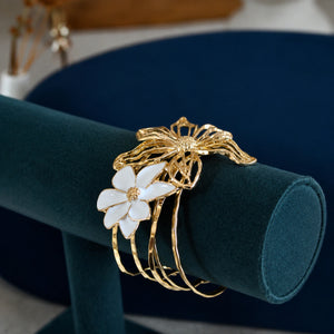 Side view of the gold openwork floral multi-band kada