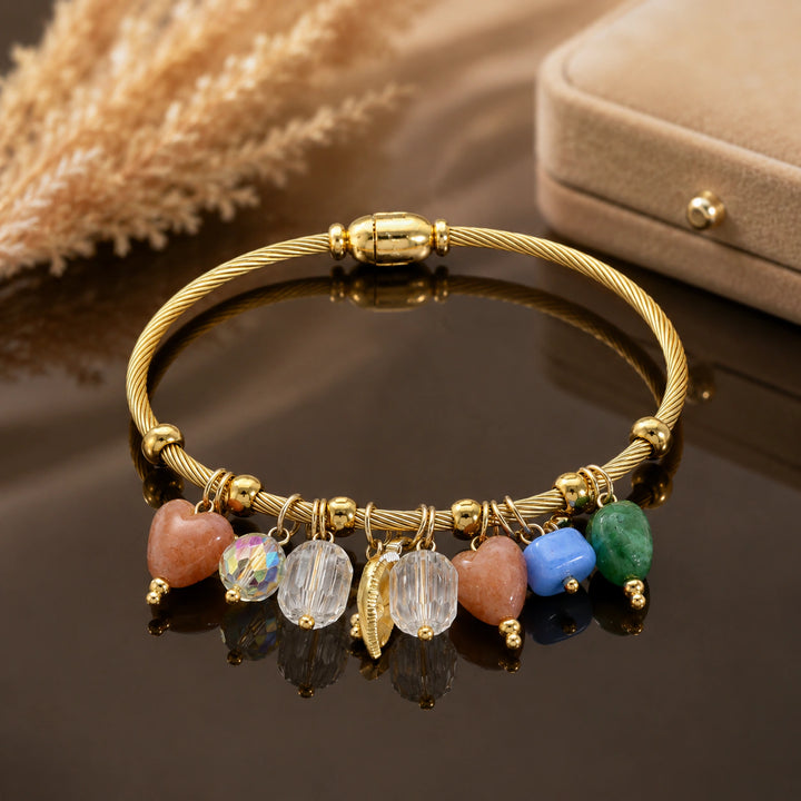 Gold-tone twisted cable pastel bead leaf charm bracelet