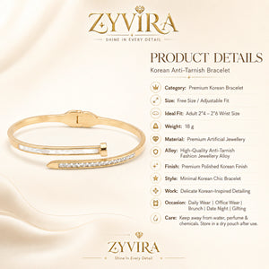 Gold pearl bar bypass kada styled in an elegant jewellery flat lay