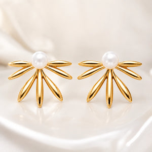 Close-up of sunburst fan textures and pearl-style centres