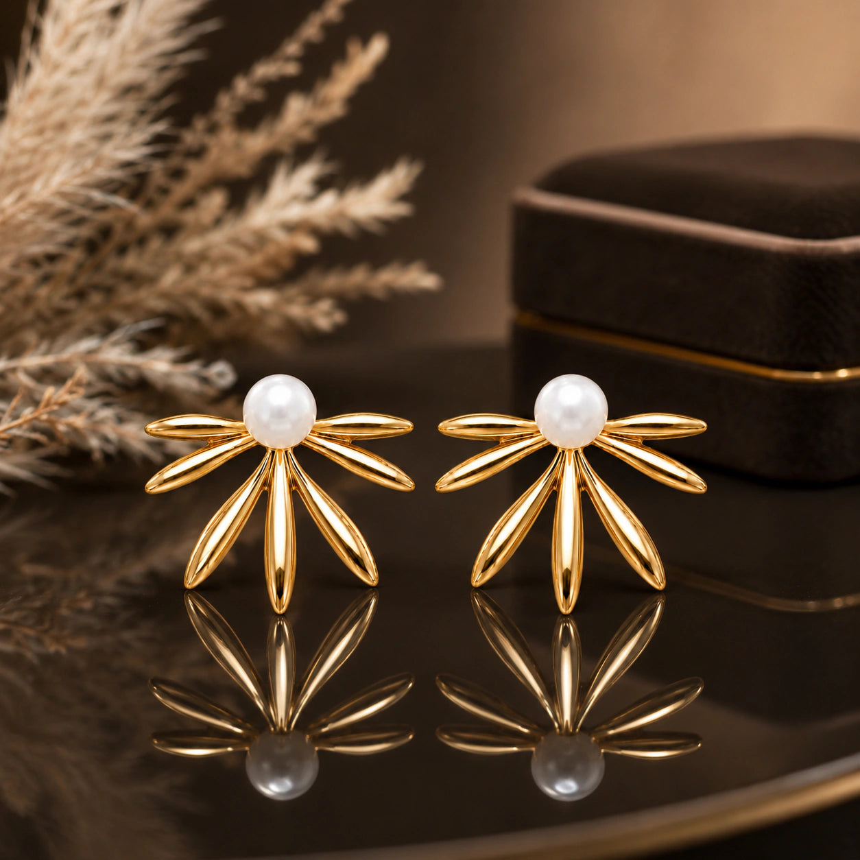 Gold-tone pearl sunburst fan stud earrings