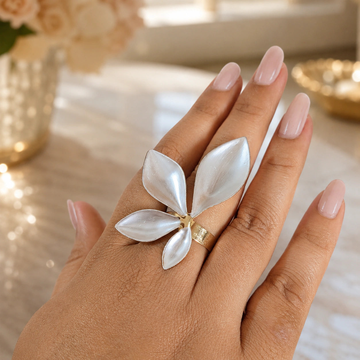 Alternate product view of the gold pearl-white botanical ring