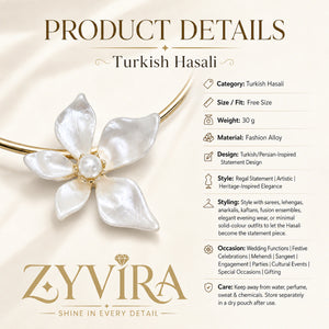 Open-collar view of the gold pearl-white floral Hasali