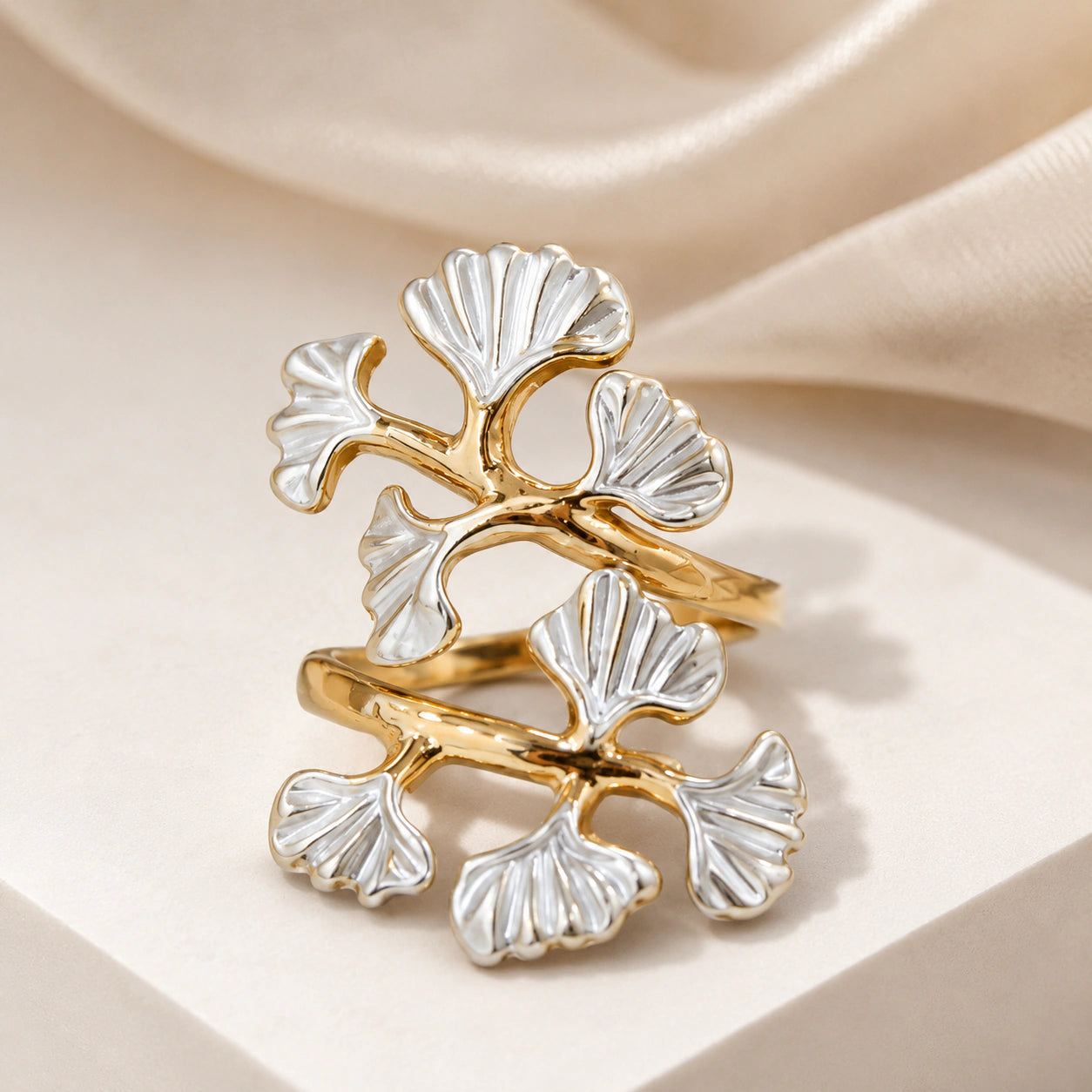 Side view of the gold pearl-white ginkgo ring