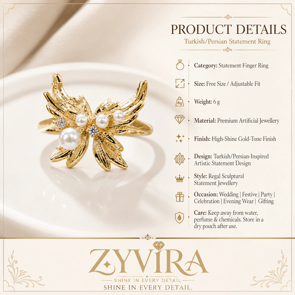 Gold pearl wing ring styled in an elegant jewellery flat lay