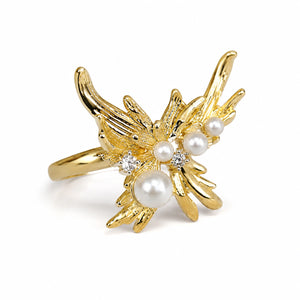 Side view of the gold pearl wing open ring