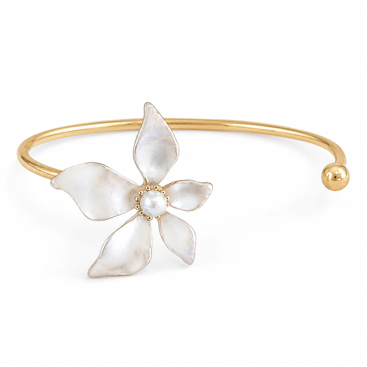 Close-up of pearly five-petal flowers and gold detailing