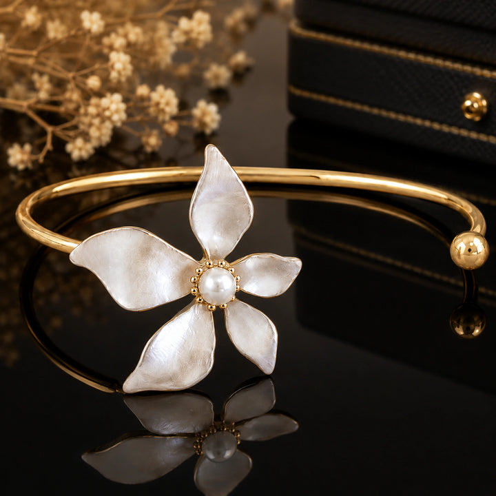 Warm gold-tone pearly five-petal floral open kada bracelet