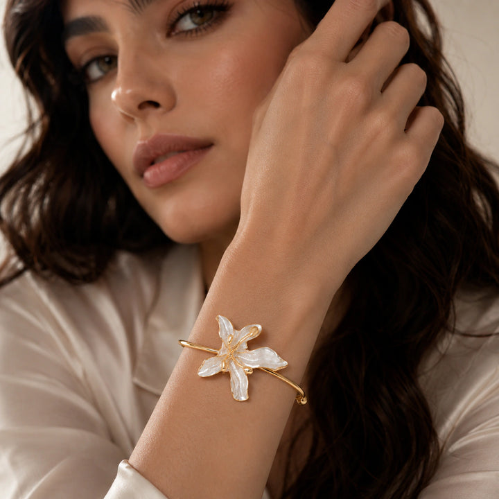 Warm gold-tone pearly lily Turkish open kada bracelet
